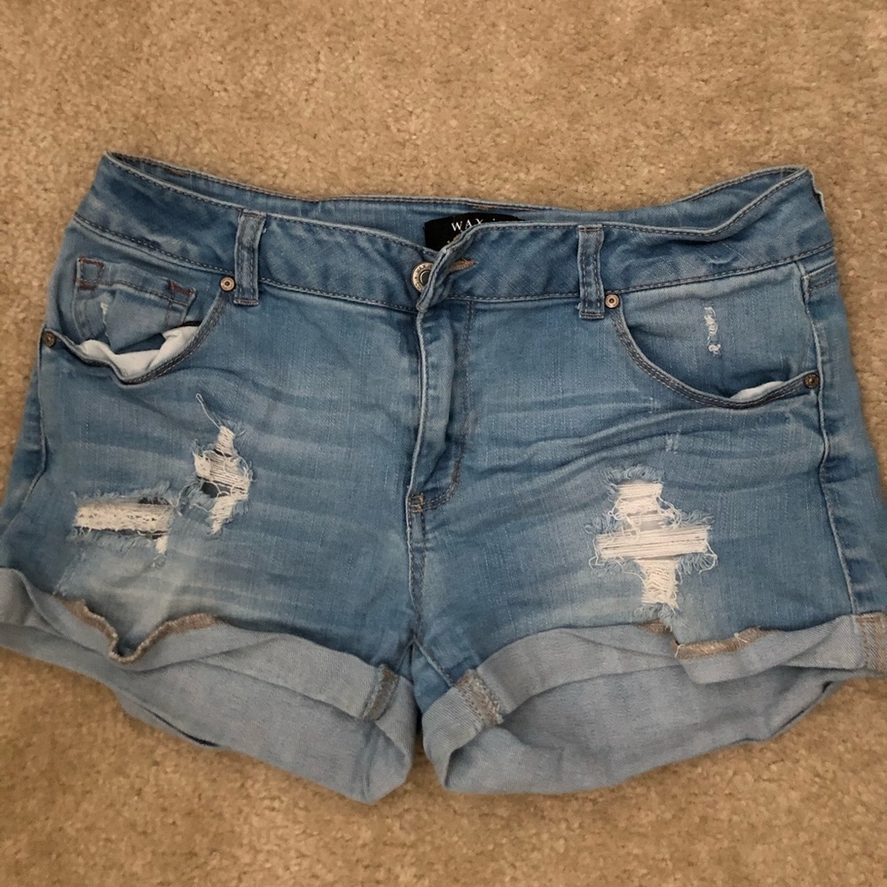 Lights blue ripped shorts